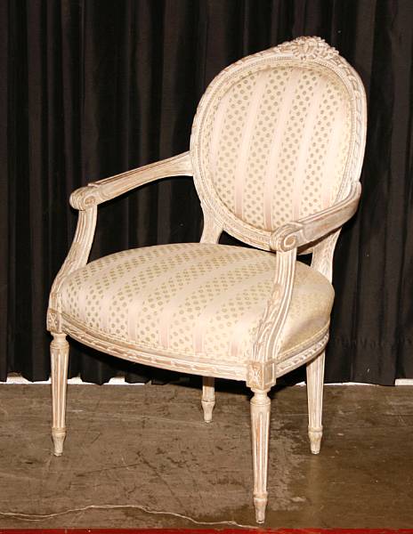 Appraisal: A pair of Louis XVI style painted fauteuils late th