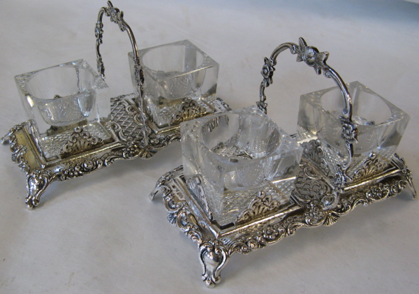 Appraisal: PAIR CONTINENTAL FINE SILVER DOUBLE SALT BASKETS each carrying basket