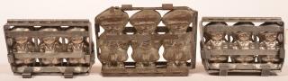 Appraisal: Three Vintage Chocolate Molds Boy in cap measure w one