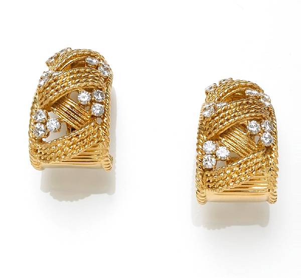 Appraisal: A pair of diamond and eighteen karat gold earrings estimated