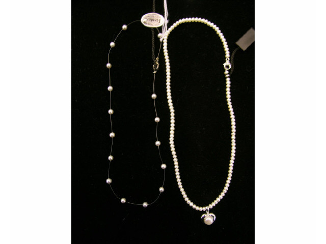 Appraisal: Two Honora pearl necklaces including cultured pearl floater and freshwater