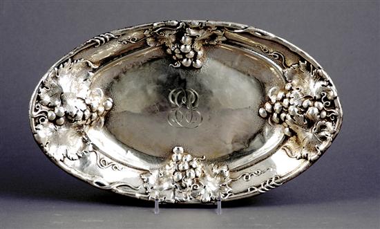 Appraisal: American silver bread tray Mauser elaborately chased grapevine oval bowl