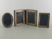 Appraisal: A silver-faced velvet backed double photo frame each leaf x