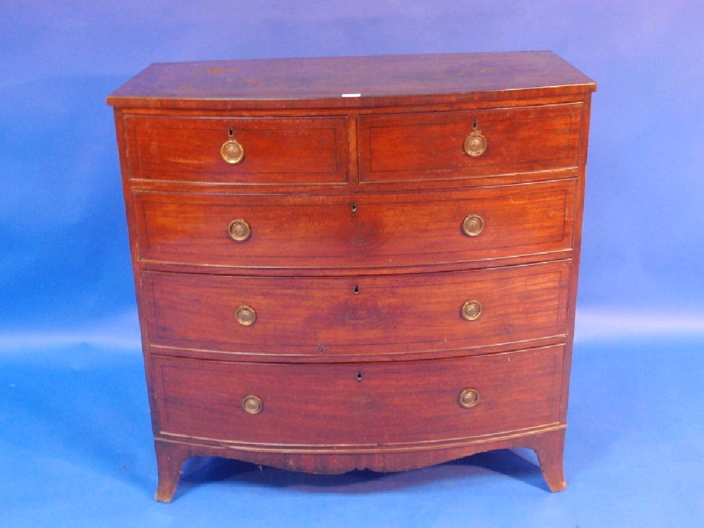 Appraisal: A George III mahogany bow front chest of two short