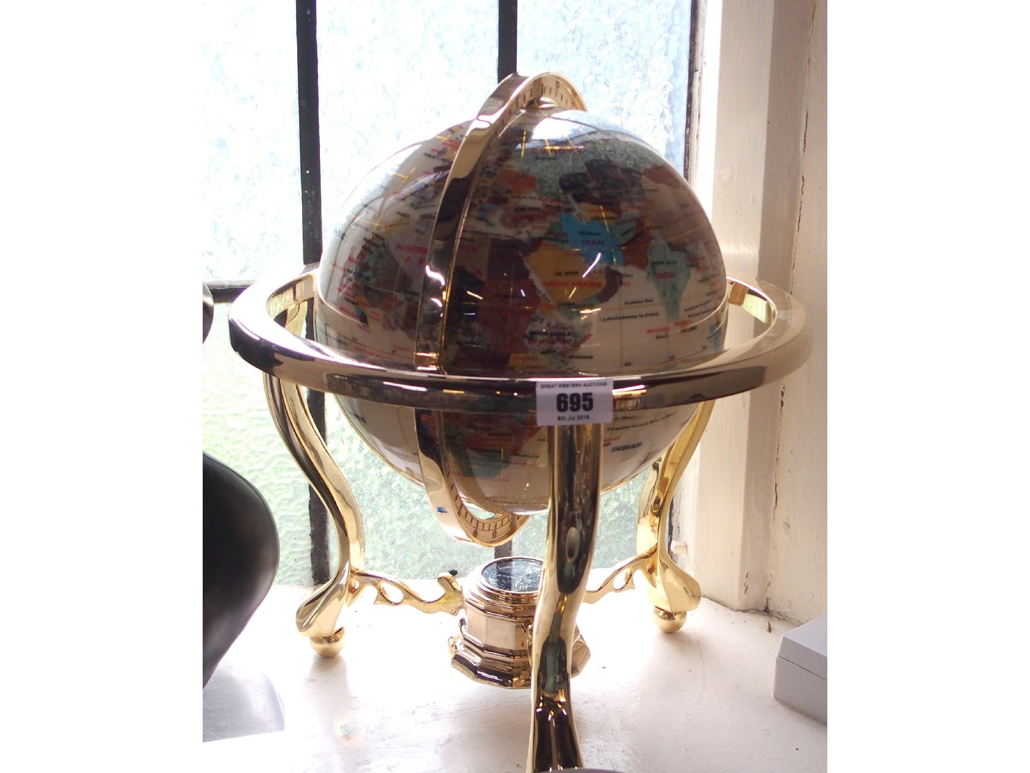 Appraisal: Small semi precious hardstone globe of the world