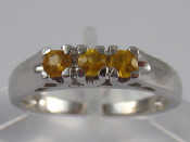 Appraisal: A carat white gold yellow sapphire ring size N gms