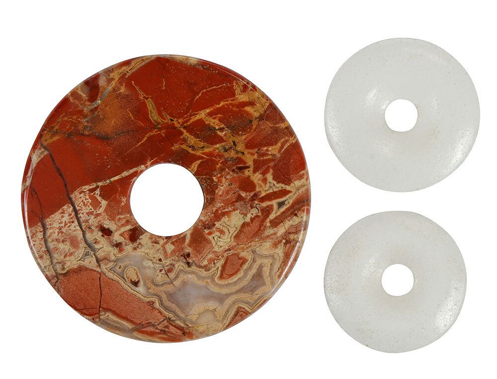 Appraisal: Three Carved Hardstone Bi Disks one brown with white veining