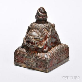 Appraisal: Carved Bronze Seal Tibet square lotus throne form the four