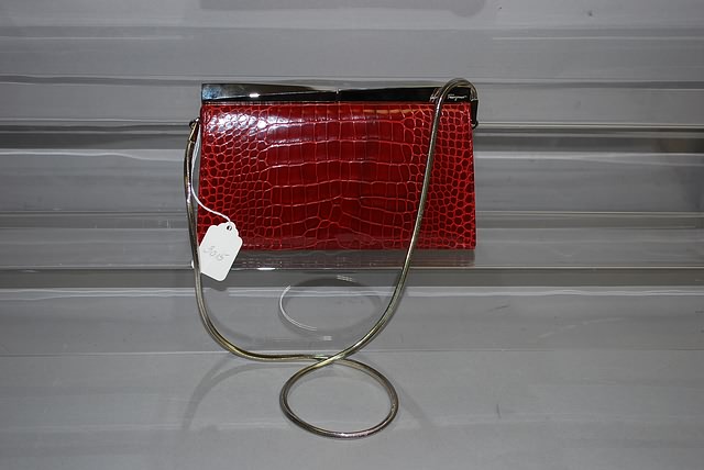 Appraisal: Salvatore Ferragamo red alligator clutch bag Good condition