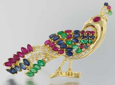 Appraisal: A Ruby Sapphire Emerald and Diamond Peacock Brooch k yellow