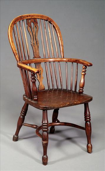 Appraisal: An ash elm and yew highback Windsor armchair second quarter