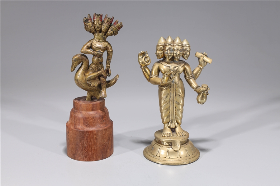 Appraisal: Two antique Indian bronze and copper alloy statues of multi-headed