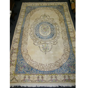 Appraisal: Plush room size area rug with tapestry pattern on off-white