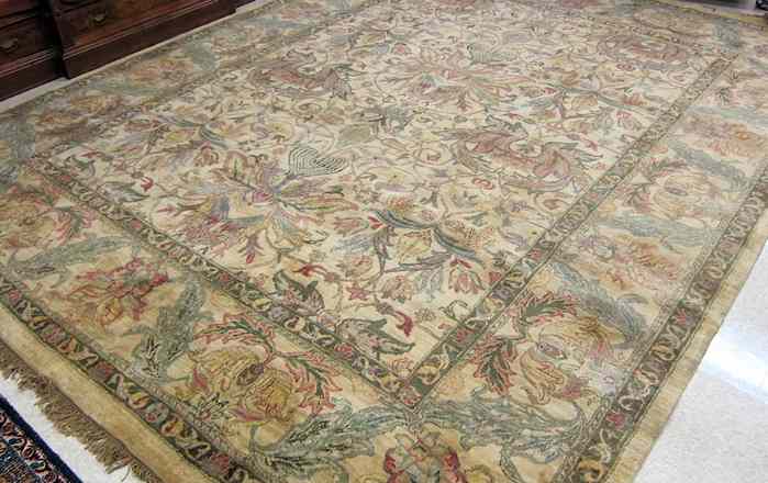 Appraisal: HAND KNOTTED ORIENTAL CARPET Indo-Persian overall foliate design on moss