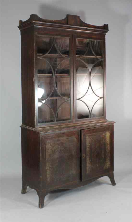 Appraisal: A George III inlaid mahogany bookcase with two astragal glazed