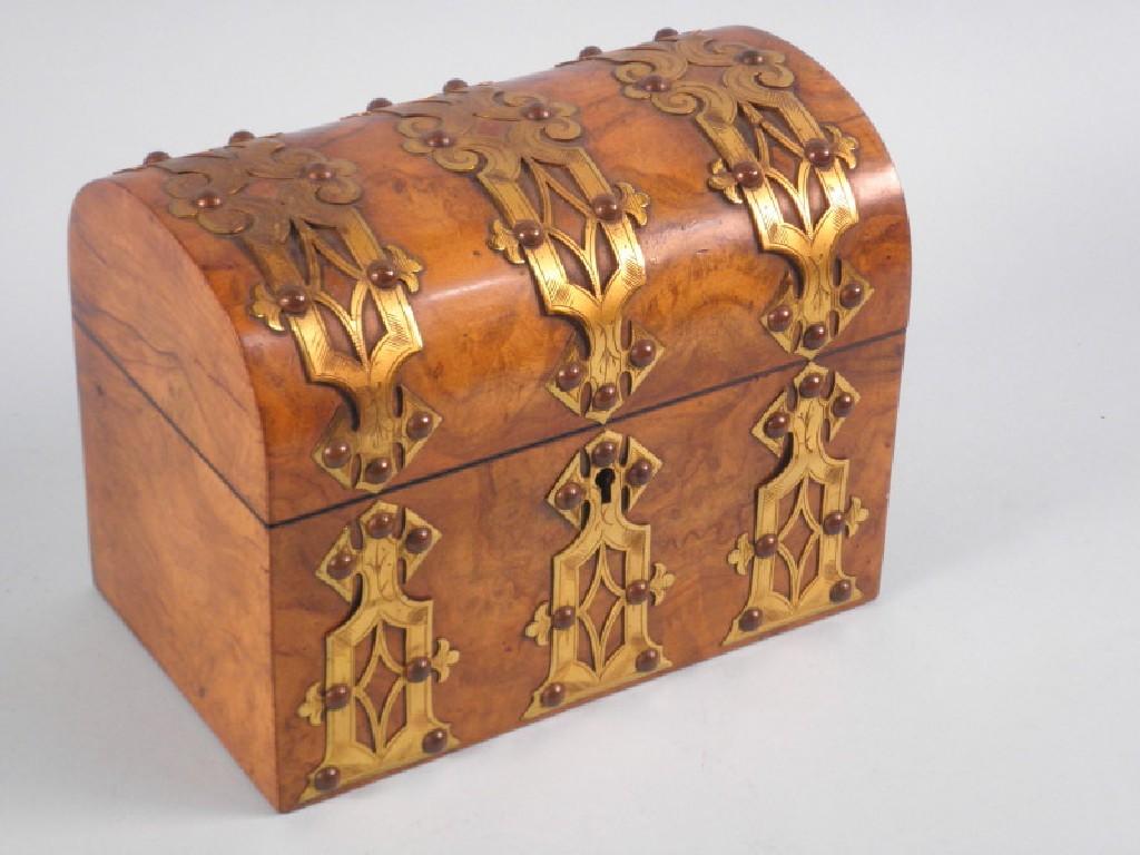 Appraisal: A Victorian walnut and brass bound tea caddy with a