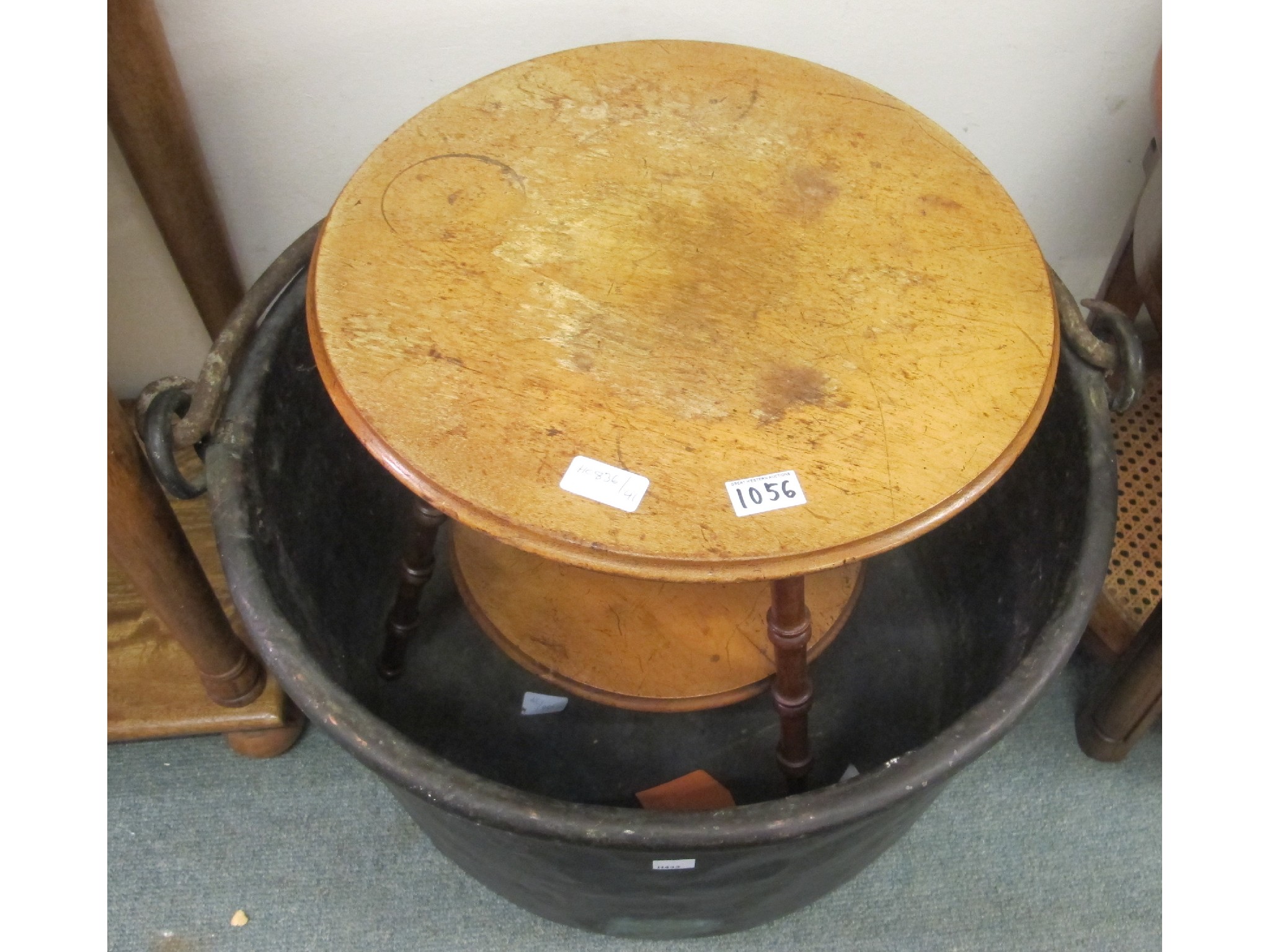 Appraisal: A large copper cauldron and a pine two tier table