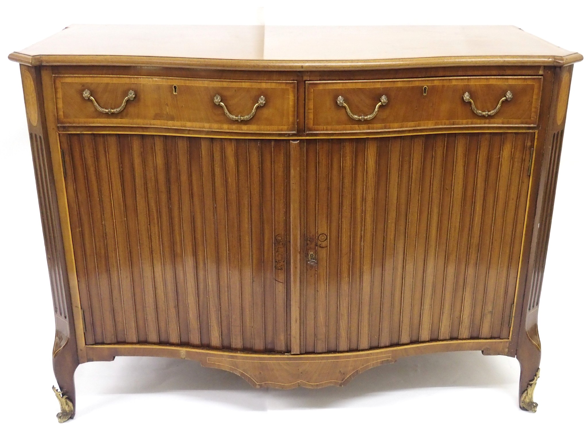 Appraisal: A mahogany and satinwood crossbanded bowfront commodewith a pair of