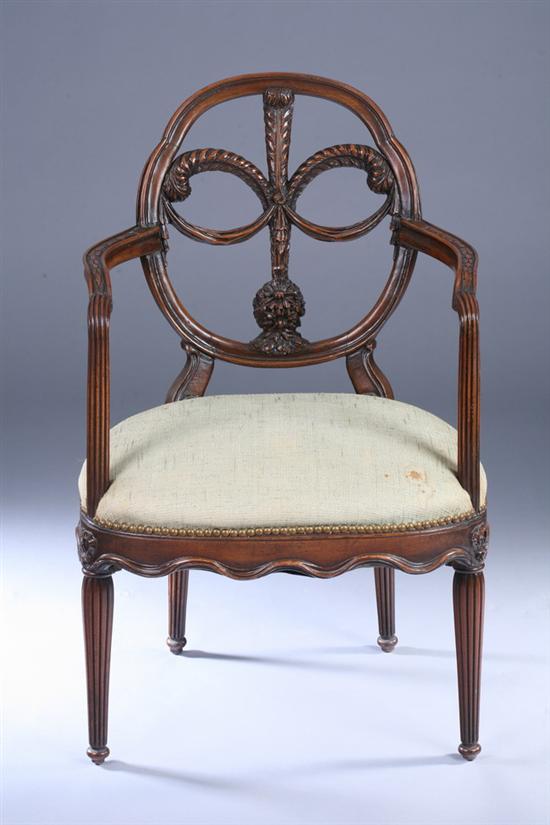 Appraisal: GEORGE III STYLE CARVED MAHOGANY ARM CHAIR th century with