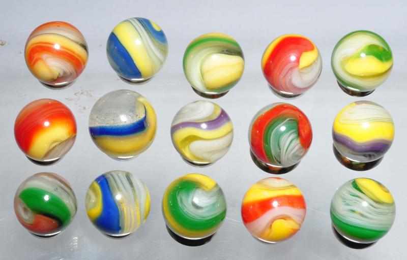 Appraisal: Lot of Akro Popeye Marbles Description Group includes four yellow