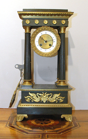 Appraisal: French Gilt and Patinated-Metal Portico Clock Estimate -