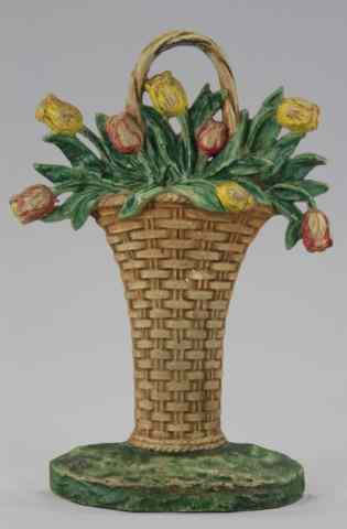 Appraisal: TULIP BASKET DOORSTOP Cast iron depicts colorful red and yellow