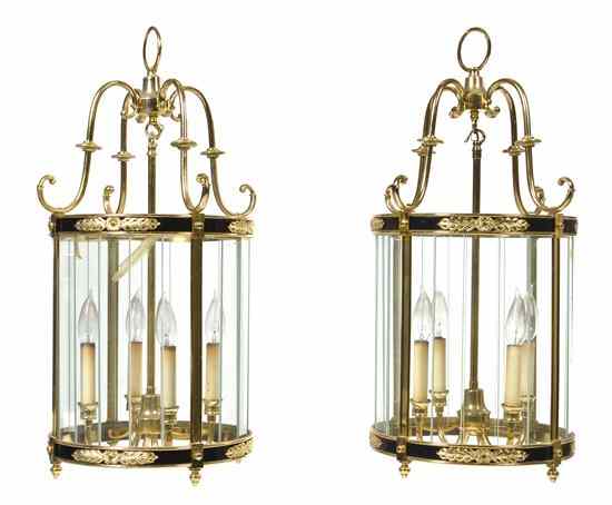 Appraisal: A Pair of Brass and Glass Four-Light Lanterns modern each