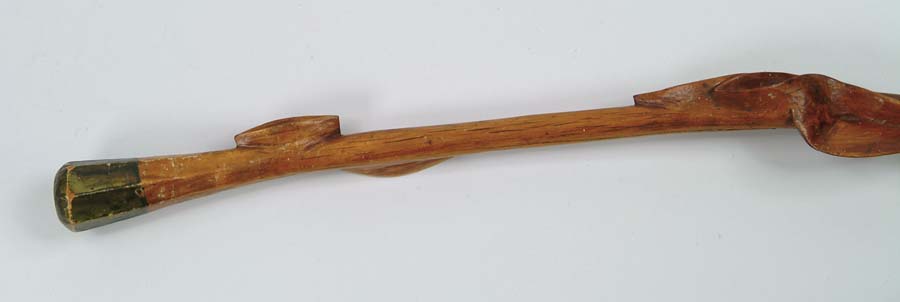 Appraisal: CANE CARVED DIAMOND WILLOW CANE Bevel carved handle with green