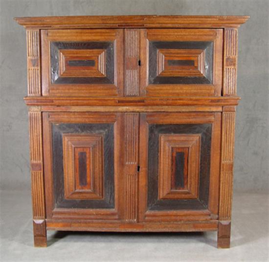 Appraisal: Oak Continental Cabinet Two piece Two heavily paneled doors in