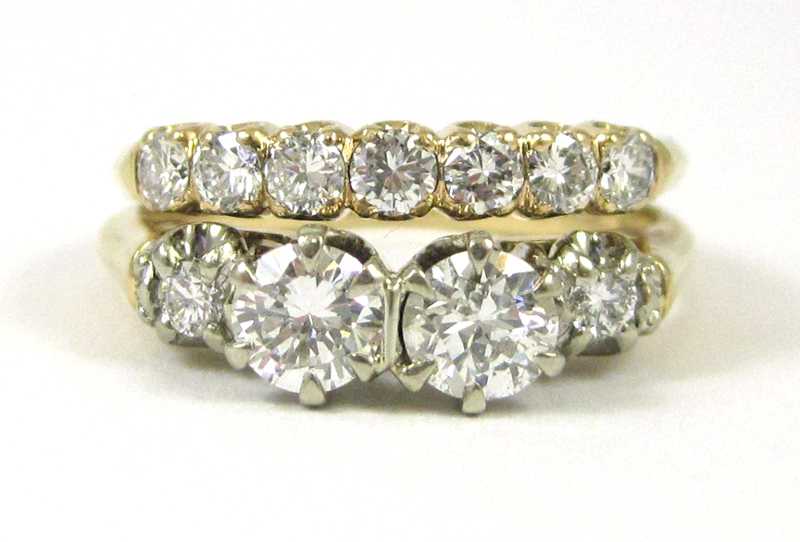 Appraisal: DIAMOND AND FOURTEEN KARAT GOLD WEDDING RING with appraisal The