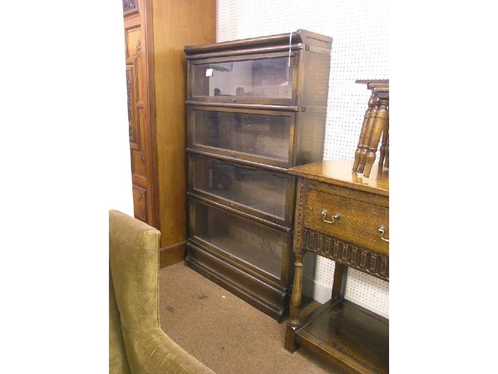 Appraisal: An oak Globe Wernicke bookcase four glazed sections on plinth