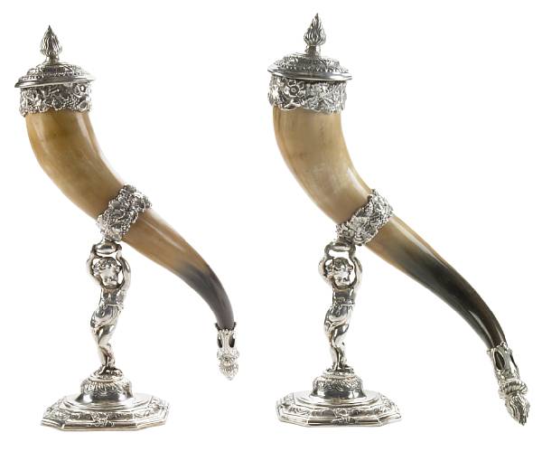 Appraisal: A pair of silverplate mounted horn table decorations Each horn