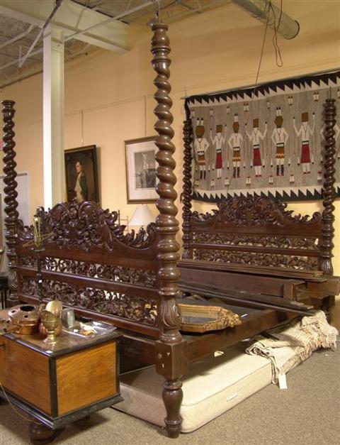 Appraisal: INDONESIAN TEAK KING SIZE FOUR-POSTER BED the head and footboard