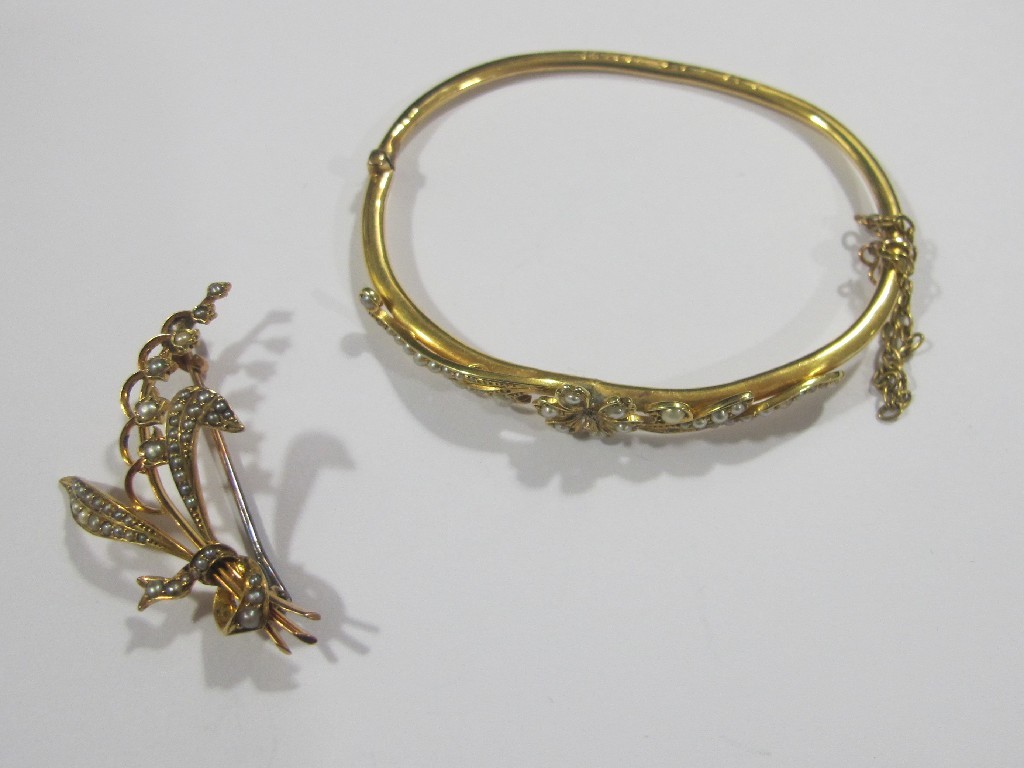 Appraisal: Edwardian ct gold seed pearl set bangle with similar brooch