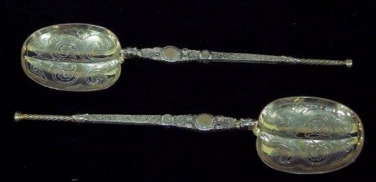 Appraisal: A pair of silver gilt anointing spoons