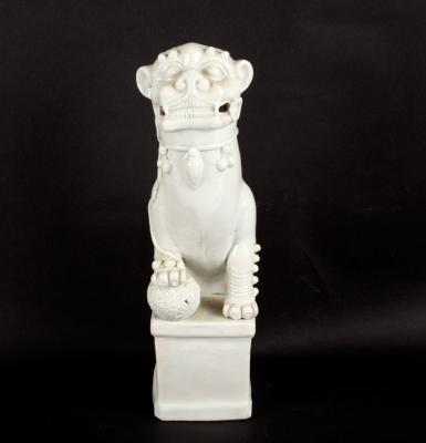 Appraisal: A blanc-de-chine figure of a dog of fo cm high