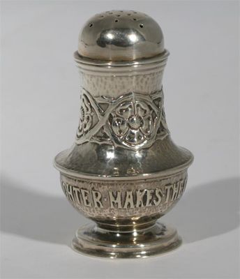 Appraisal: A Ramsden and Carr pepper hammered finish with dog rose