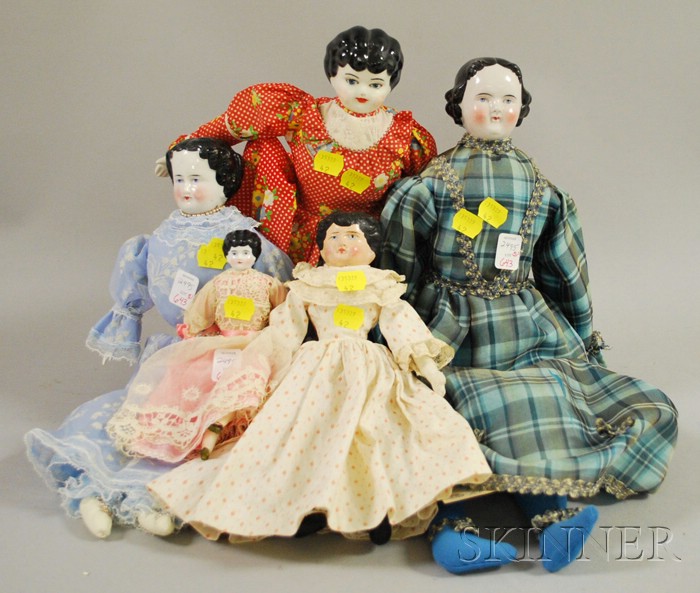 Appraisal: Four Painted Porcelain Head Dolls and a Painted Composition Head