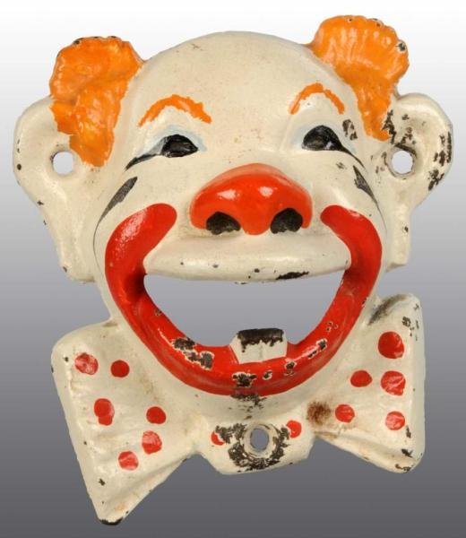 Appraisal: Cast Iron Clown Wall Mount Bottle Opener Description Made by