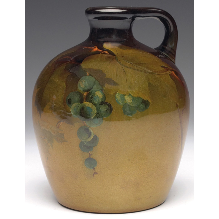 Appraisal: Rookwood handled vessel Standard glaze with painted blueberries executed by