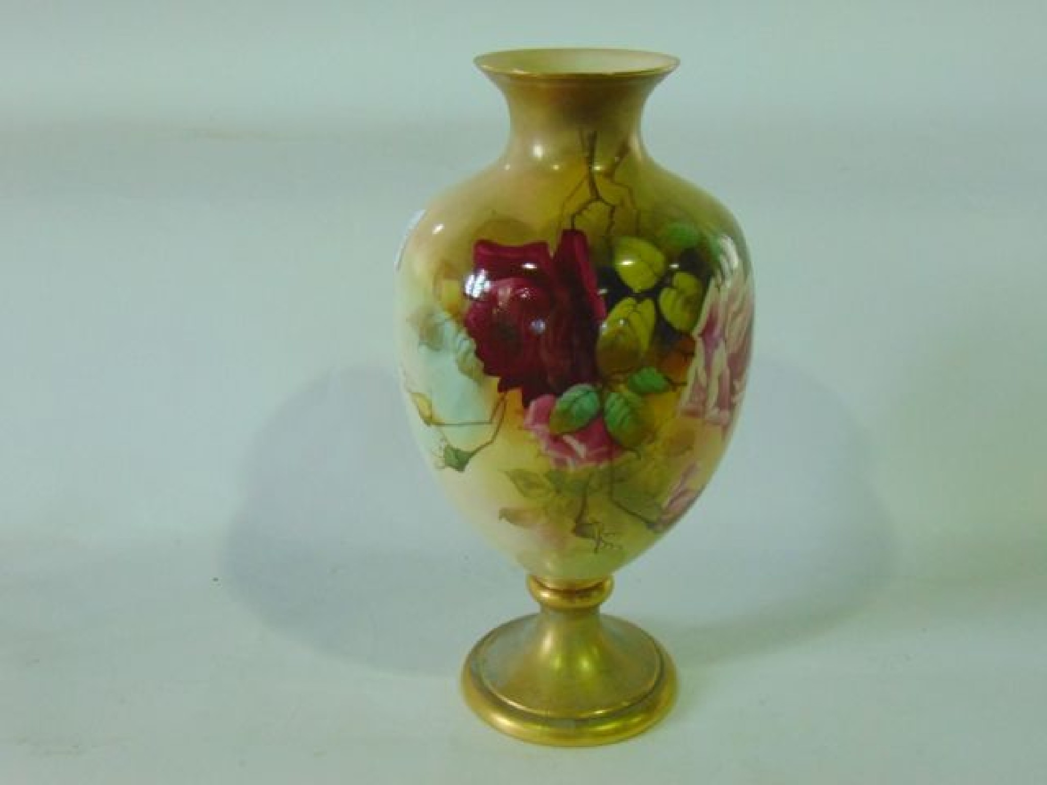 Appraisal: A Grainger Royal Worcester blush ivory vase of urn shaped