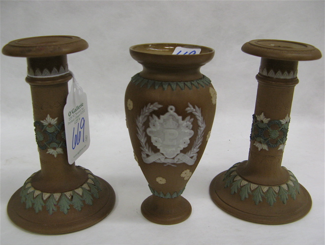 Appraisal: THREE DOULTON LAMBETH ENGLAND STONEWARE PIECES including a pair of