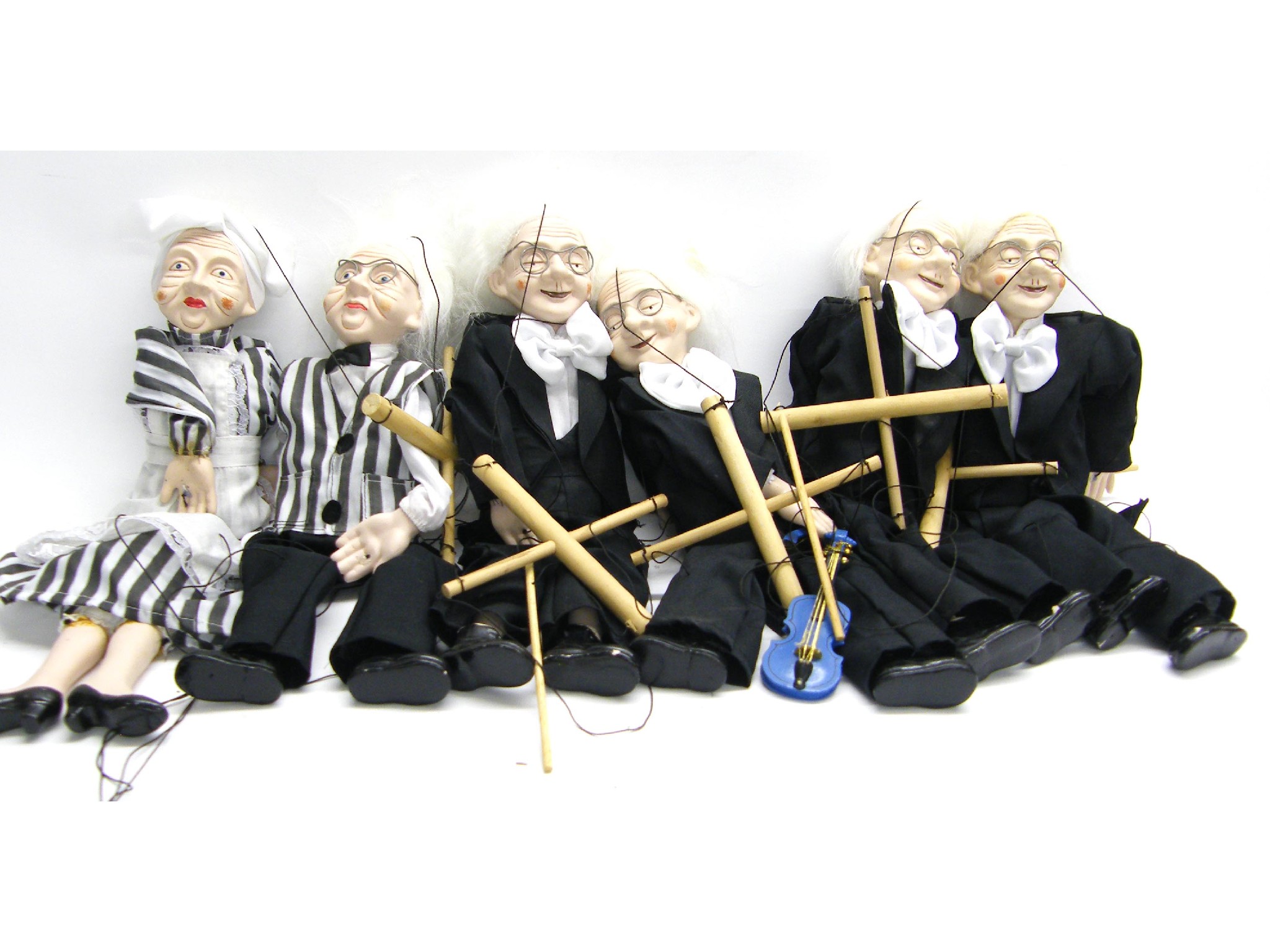 Appraisal: Six similar string puppets of performance artists