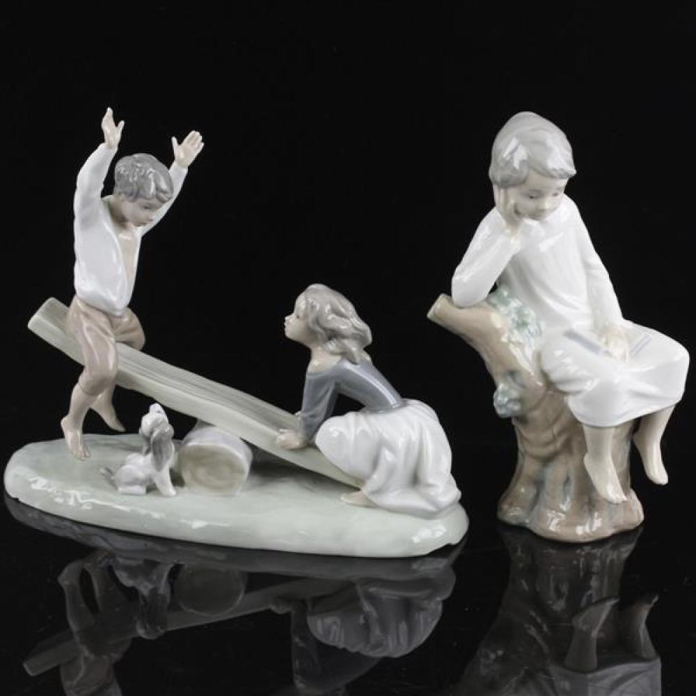 Appraisal: TWO LLADRO PORCELAIN FIGURINES BOY AND GIRL ON SEESAW FIGURE