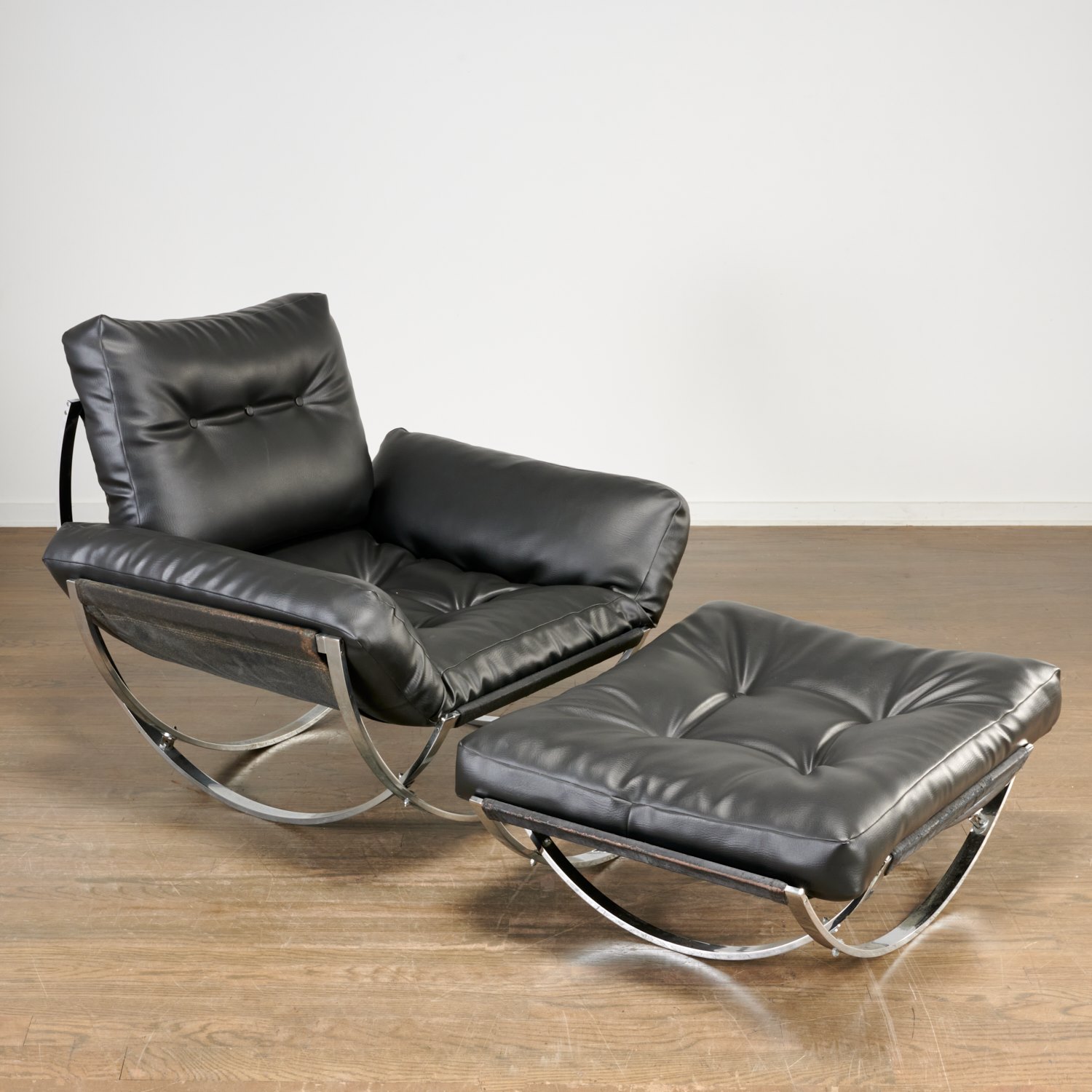 Appraisal: LEONART BENDER APOLLO LOUNGE CHAIR AND OTTOMAN c chromed flat