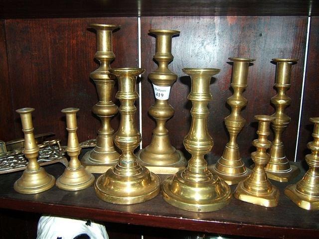 Appraisal: A collection of th Century and later brass candlesticks