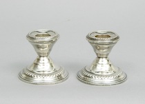 Appraisal: A Pair of Sterling Silver Candlesticks An elegant pair of