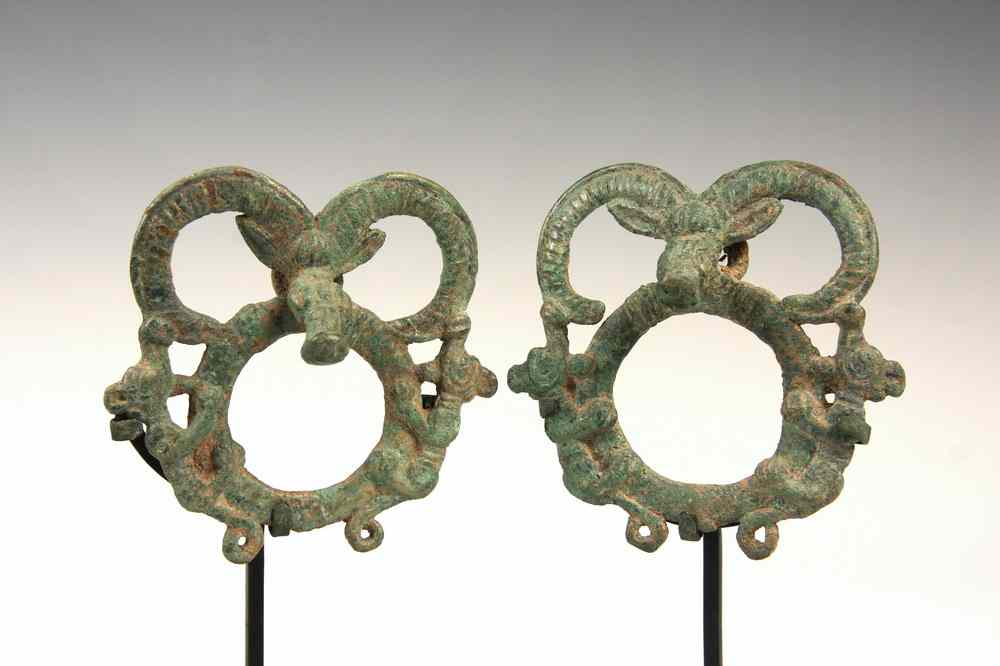 Appraisal: PAIR BRONZE LURISTAN MOUNTS - Circa nd millennium BC A