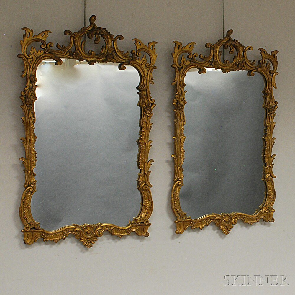 Appraisal: Pair of Rococo-style Carved Giltwood Mirror the rectangular frames adorned