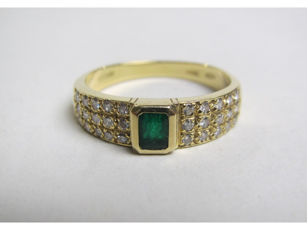 Appraisal: Eighteen carat gold emerald and diamond set dress ring with